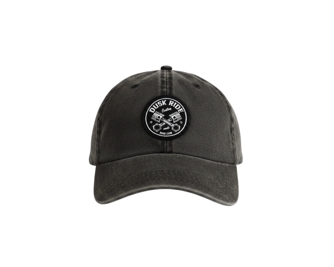 Dusk Ride Vintage Cap in verwaschenem Schwarz aus Baumwolle mit rundem Pistons-Patch auf der Vorderseite