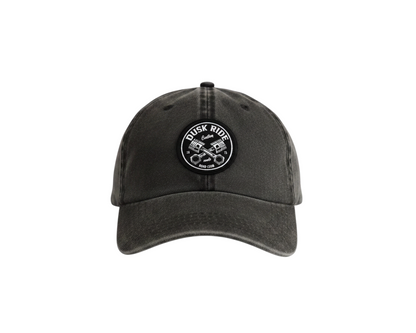 Dusk Ride Vintage Cap in verwaschenem Schwarz aus Baumwolle mit rundem Pistons-Patch auf der Vorderseite